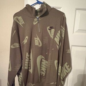 Nike Green Zip Up Sweater with Swoosh Pattern
